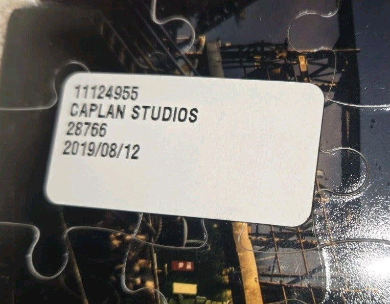 2 CAPLAN STUDIOS 60 PIECE PUZZLES 1) CHEERIES IN A PLANTER 2) DONNY S TUG BOAT