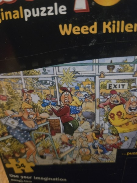 A MUST HAVE FOR PUZZLE LOVERS... Wasgij Original Mini 1 - Weed Killer - 54 Piece Jigsaw Puzzle NEW SEALED