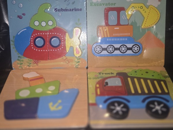 4 CHILDRENS 4-6 PIECE WOODEN PUZZLES; TRUCK, EXCAVATOR, SUBMARINE & SHIP. SEALED